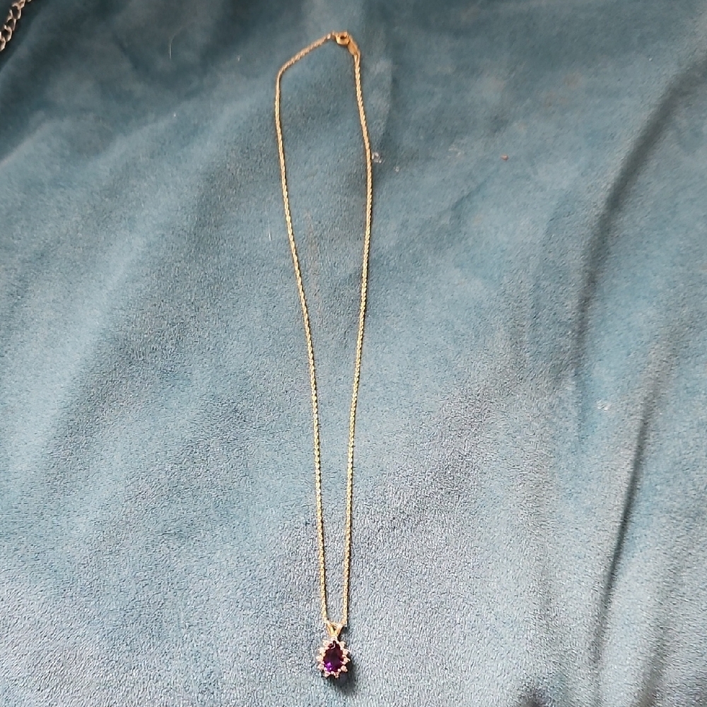 Elegant Gold Necklace with Purple Gemstone